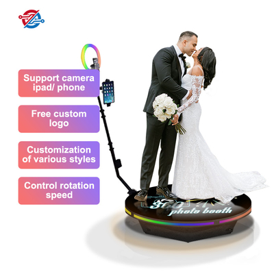 La plataforma giratoria automática de la cabina de la foto del hilandero 360 para casarse promueve la relación